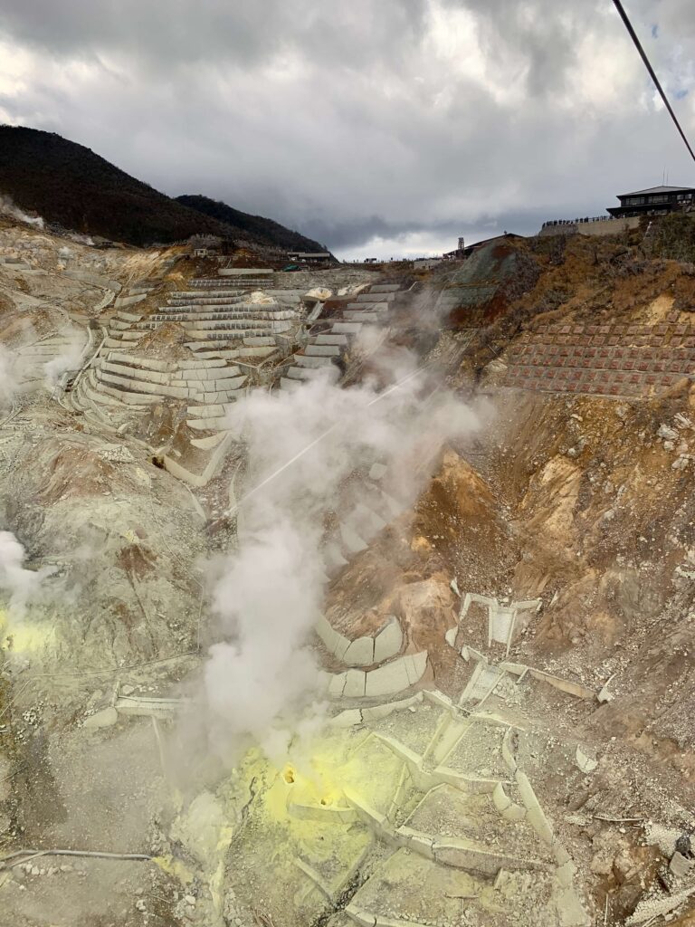 Sulphur vents steaming at Owakudani volcanic valley in Hakone
