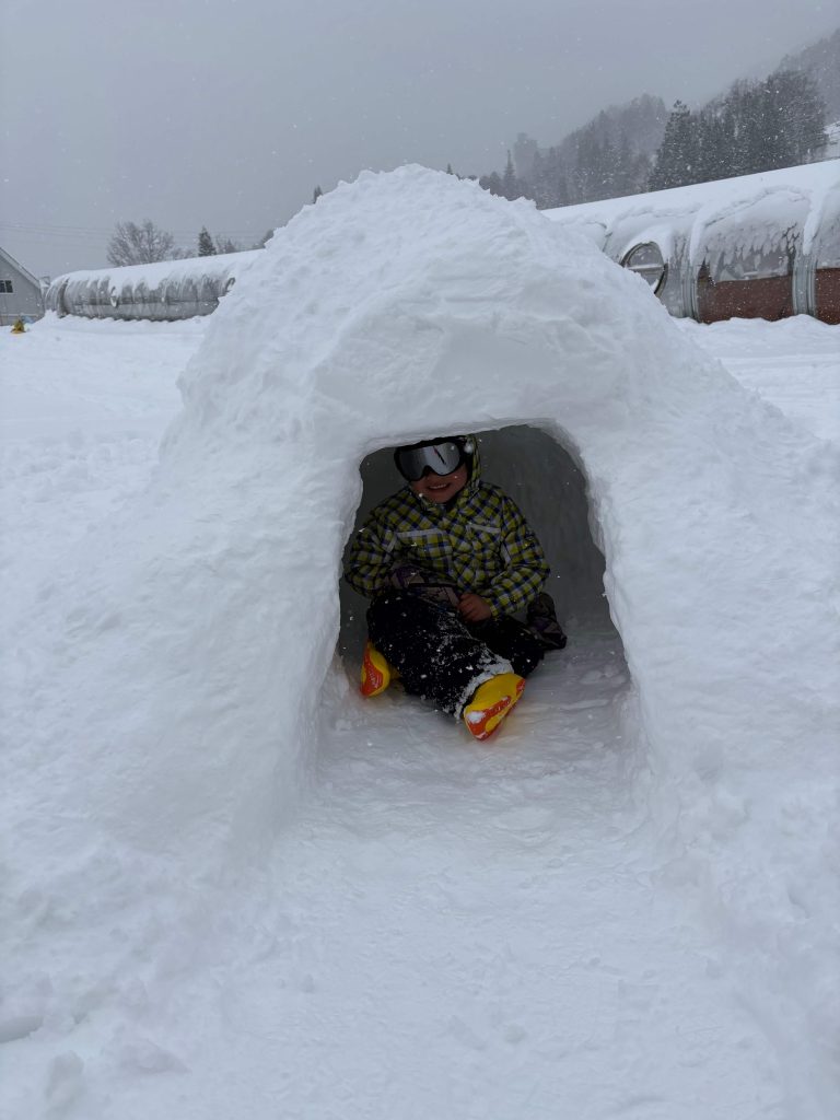 My kid inside his kamakura (snow dome), Hakuba, Nagano